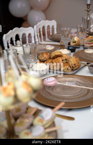 Elegant sweet table with sweets and decoration baby shower party Stock Photo