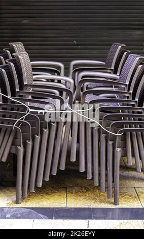Detail of chairs to sit stored and stacked Stock Photo