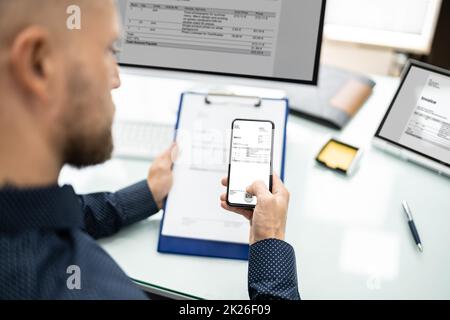 Taking Document Picture Or Photo With Phone Stock Photo