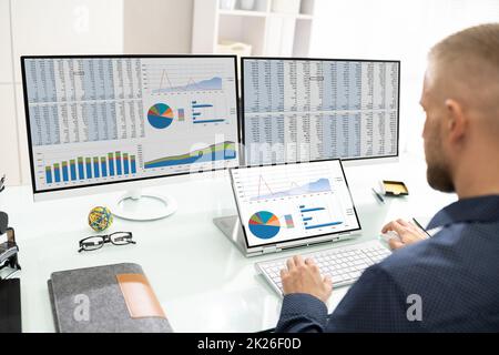 Analyst Working With Spreadsheet Business Data Stock Photo