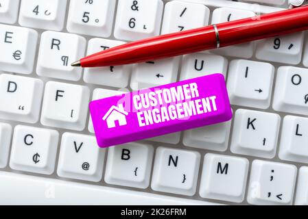 Text sign showing Customer Engagement. Word for communication connection between a consumer and a brand Creating Online Chat Platform Program, Typing Science Fiction Novel Stock Photo