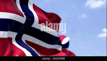 Detail of the national flag of Norway waving in the wind on a clear day ...