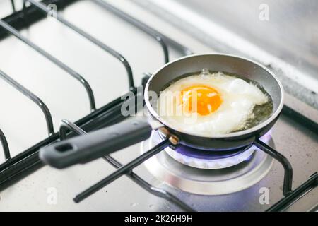 Fried eggs in the pan close up , Stock Photo
