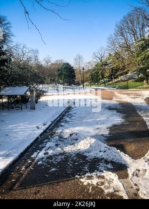 Buttes-Chaumont Park under the snow in winter, Paris Stock Photo