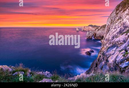 Scenic panorama of the Acantilados del infierno in Spain, Asturias at sunset. Stock Photo