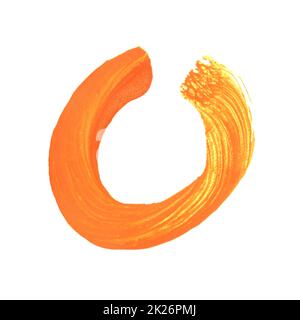 Orange hand paintes circle made with paintbrush Stock Photo