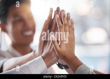 Success, teamwork and high five by team collaboration in support of goal or vision for global success. Motivation, community and innovation with Stock Photo