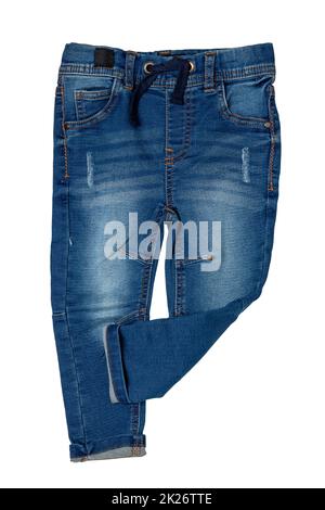 Blue jeans. Closeup of a trendy stylish dark blue denim pants or trousers for boys isolated on a white background. Clipping path. Kids summer and autumn fashion. Front view. Stock Photo