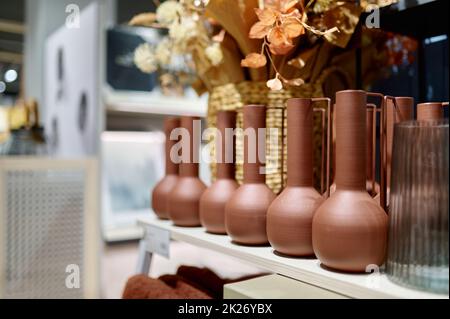 Porcelain vase shop assortment on shelves rack Stock Photo