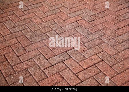 The pattern of a pink concrete outdoor walkway Stock Photo
