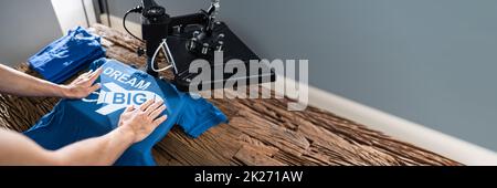 Printing On T-Shirt In Workshop Stock Photo