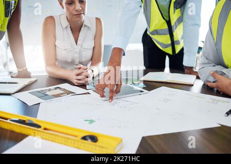 Construction, blueprint and planning with architect in meeting for consulting, project management and vision. Design, engineering and construction Stock Photo