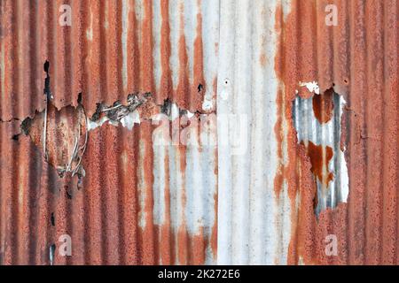 Rust that corrosion  metal surfaces causes strange colors. The surface of the metal is rusted, corrosion causes the metal to look old because of the c Stock Photo