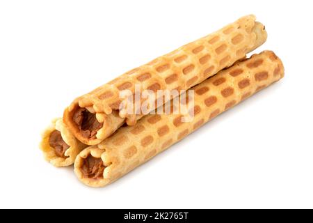 Wafer rolls with condensed milk isolated on white background Stock Photo
