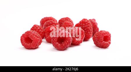 Fresh red ripe raspberries isolated on white Stock Photo