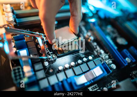 Motherboard Microchip In Hand. Computer Testing Stock Photo