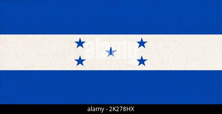 National Honduras flag on fabric surface. Fabric Texture Stock Photo