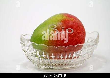 ripe and labeled organic mango Stock Photo