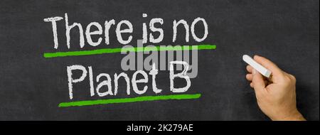 Text written on a blackboard - There is no Planet B Stock Photo