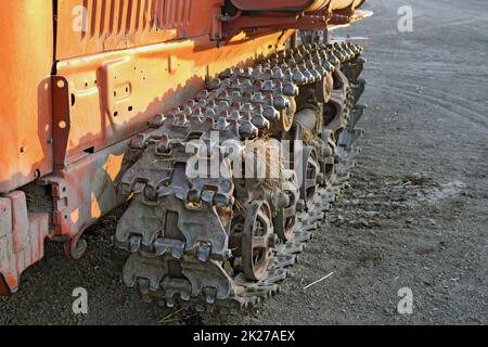 Caterpillar track of the old tractor Stock Photo