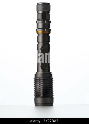 black metal portable flashlight isolated on white background Stock Photo