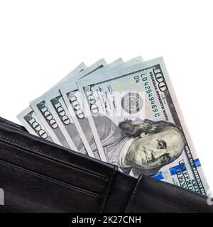 A black wallet with dollars in it on a white background. Stock Photo