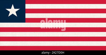 Flag of Liberia. national symbol of Liberia. Fabric Texture. Stock Photo