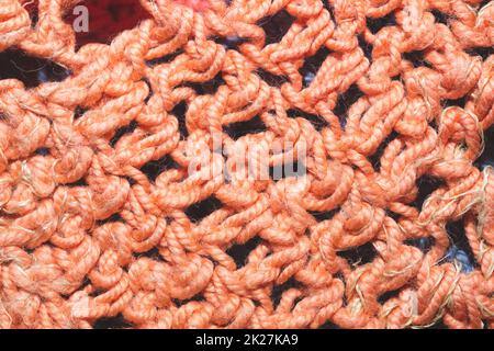 Weaving threads. knitted background. fabric close up Stock Photo