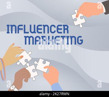 Text sign showing Influencer Marketing. Word Written on form of social media commerce involving endorsements Illustration Of Hands Holding Jigsaw Puzzle Pieces Helping Each Others. Stock Photo