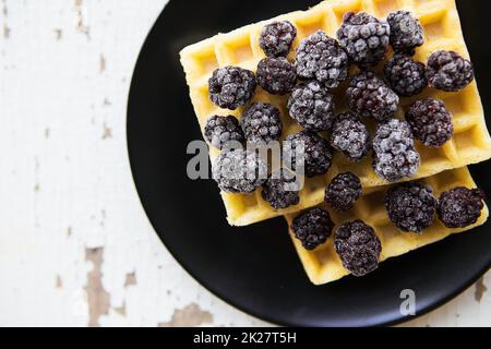 Belgian waffles with blackberry Stock Photo