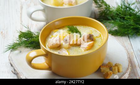 Creamy fish soup with salmon, potatoes, onions , carrots, dill and celery . Kalakeitto- traditional dish of the Finnish cuisine or Russian  Ukha Fish Head Soup. Healthy Food Concept. Omega -3 Stock Photo