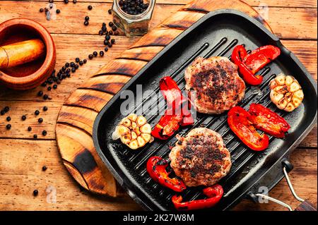 Fried beefsteak in bacon Stock Photo