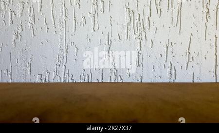 Empty top of a natural wooden table and retro white decorative wall. To display the product. Wooden table and white wall. Empty wooden tabletop, counter, shelf in the wall of the room Stock Photo