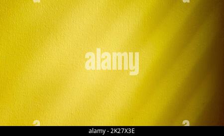 Yellow wall texture. Colorful concrete wall. Background and texture with Paint color on wall plaster. Close up texture old wall concrete Stock Photo