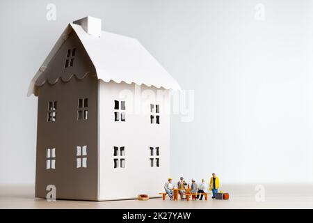 Builders having break at construction site Stock Photo