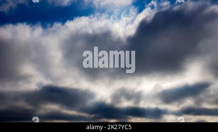 Background of dark clouds before a thunderstorm. Stock Photo