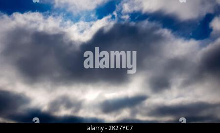 Background of dark clouds before a thunderstorm. Stock Photo