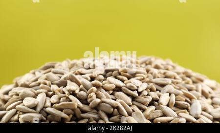 Sunflower seeds, peeled, without shell. Background of peeled not roasted seeds. Stock Photo