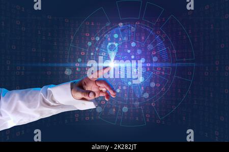 hand on the background of binary code on a virtual screen Stock Photo
