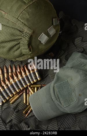 Photo of 5.56mm ammunition, machine gun bullets belt, rifle ammunition Stock Photo