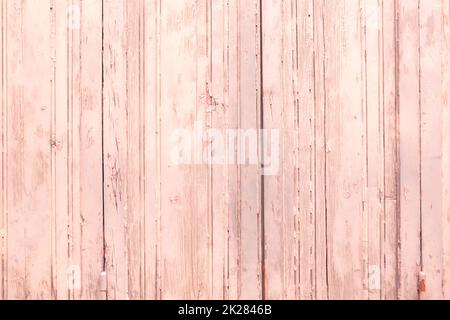 Weathered pink wooden boards background Stock Photo