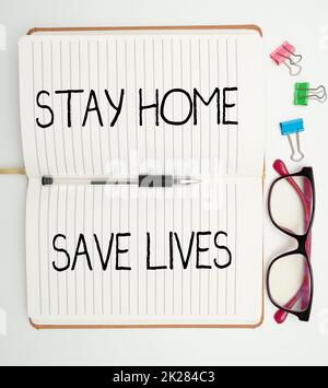 Text caption presenting Stay Home Save Lives. Conceptual photo lessen the number of infected patients by not leaving the house Multiple Assorted Collection Office Stationery Photo Placed Over Table Stock Photo