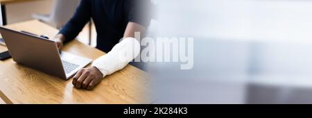 Injured Worker Compensation. Broken Arm African Man Stock Photo