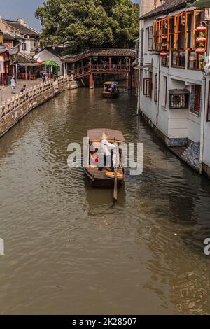 Water taxi on the Dong shi river in the ancient town of Zhujiajiao which is in the Qingpu District of Shanghai, China Stock Photo