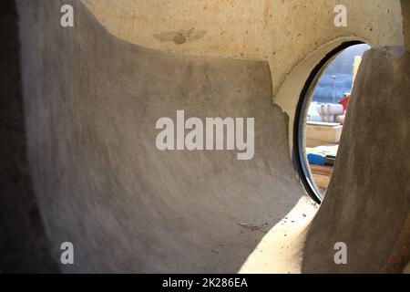 View into a sewage shaft from the perspective of the canal Stock Photo