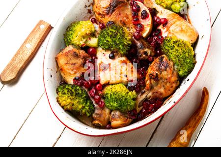 Baked chicken legs with broccoli. Stock Photo