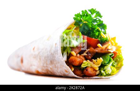 Tortilla with chicken and fresh vegetables isolated on white Stock Photo