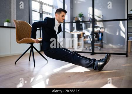 Triceps Dips Exercise Using Chair Stock Photo