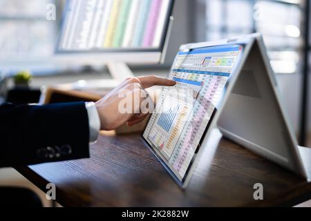 Analyst Working With Spreadsheet Business Data Stock Photo
