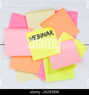 Webinar online workshop training internet learning teaching seminar education business concept desk note paper Stock Photo